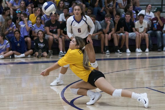 Lemoore's Leah Rodrigues hits the floor in Tuesday's win against Tulare Union.